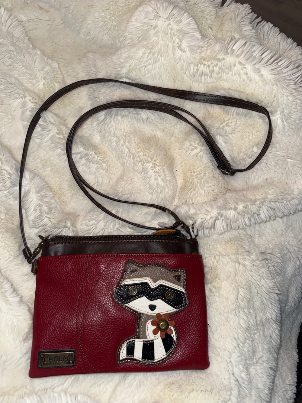Chala Red Crossbody Bag with Raccoon Appliqué and Brown Trim